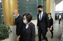 郭晶晶夫妇出席李兆基丧礼，体育明星与商界巨擘的深情致敬